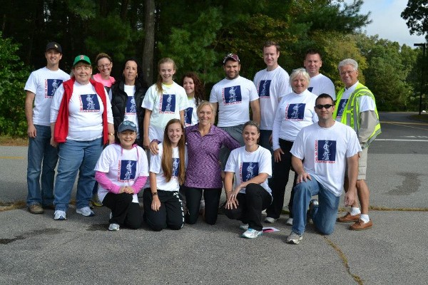 The Young AFCEAN team and other volunteers celebrate the successful inaugural 5K Family Fun Run/Walk in September.
